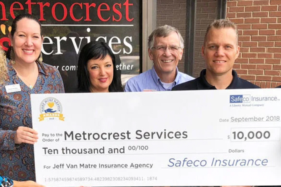 Jeff Van Matre Insurance Agency - Team Giving Back with a Large Check
